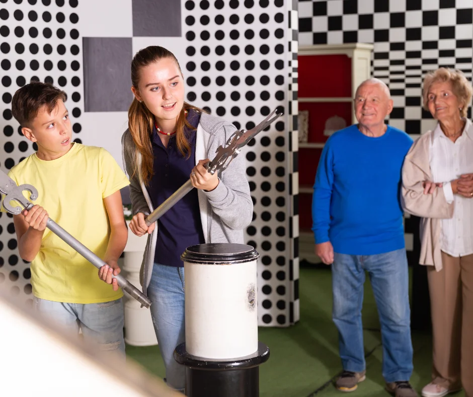 people of all ages solving an escape room