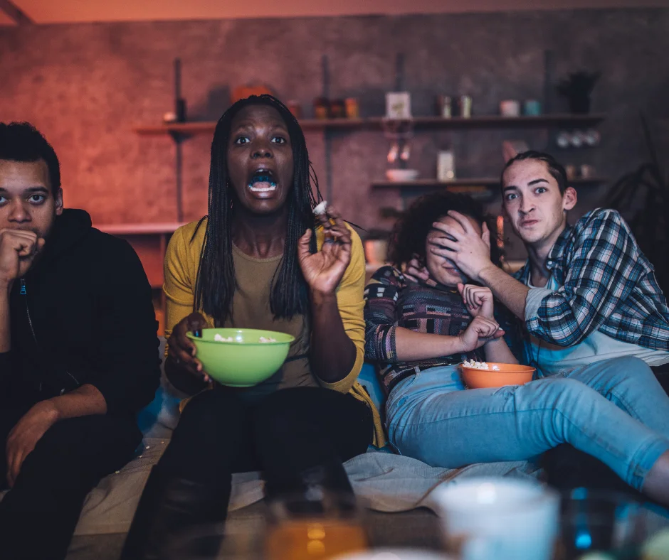 Friends watching a list of escape room movies