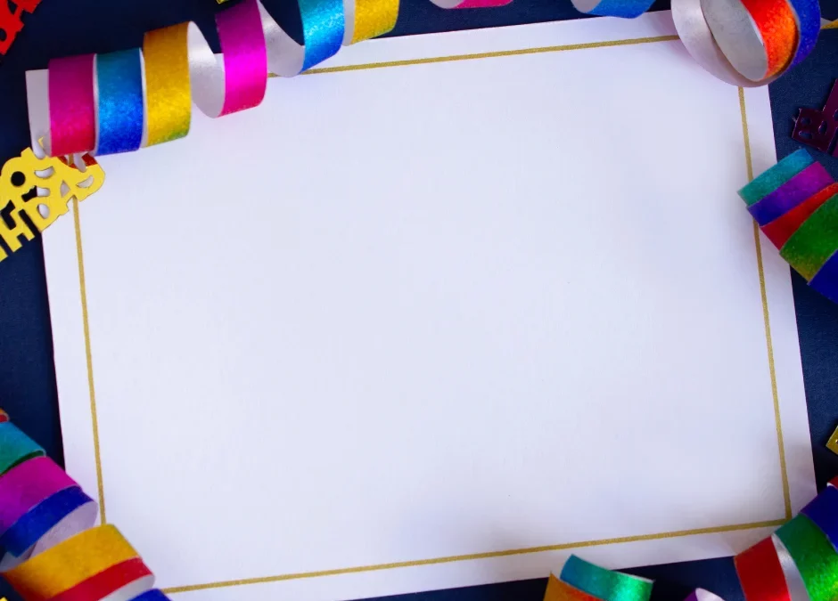 Escape room birthday party invitations on a desk