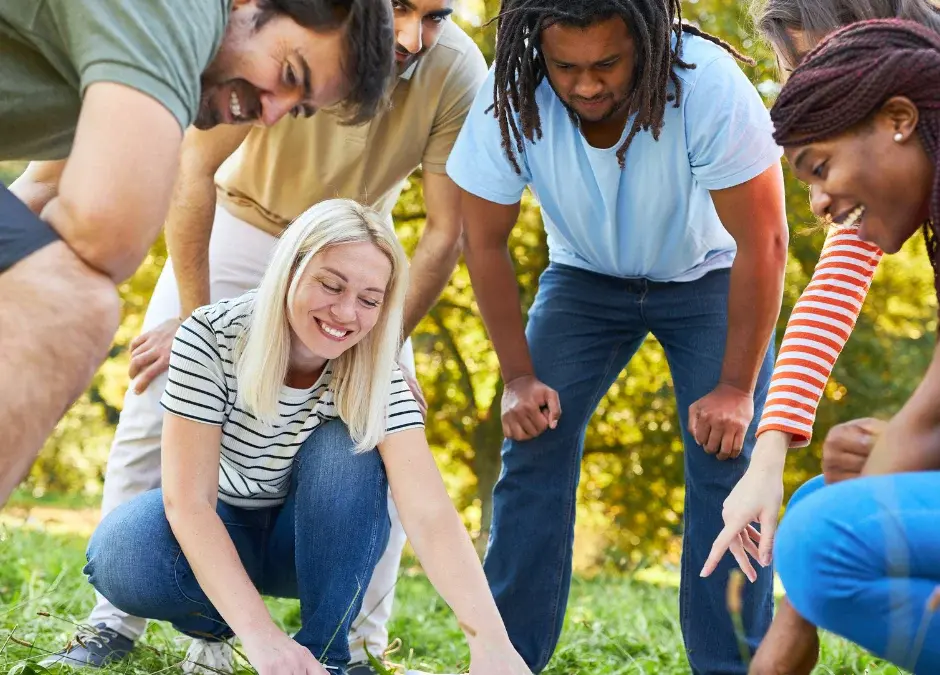 Adults playing scavenger hunt in Toronto with friends