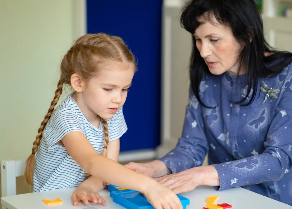 Teacher learning how to make learning fun to student with escape room puzzle